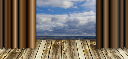 theater scene from the old, wooden planks. Dark brown curtain, consisting of two halves In the background of a scene of blue sky with clouds.
の写真素材