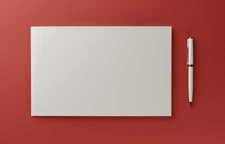 Blank photorealistic book mockup isolated on red background.の写真素材