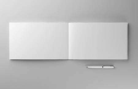 Blank photorealistic brochure mockup on light grey backgroundの写真素材