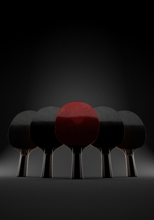 Five rackets for playing table tennis on epic black background. 3d illustration. With copy space. Concept of team.の写真素材