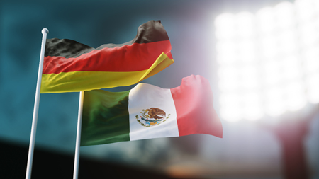 3D Illustration. Two national flags waving on wind. Night stadium. Championship 2018. Soccer. Germany versus Mexicoの写真素材