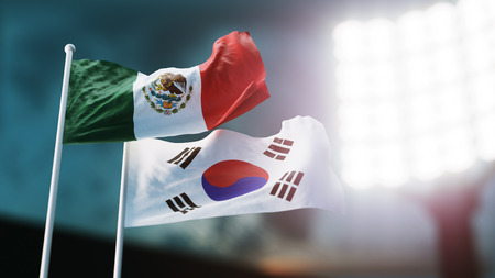 3D Illustration. Two national flags waving on wind. Night stadium. Championship 2018. Soccer. Mexico versus South Koreaの写真素材