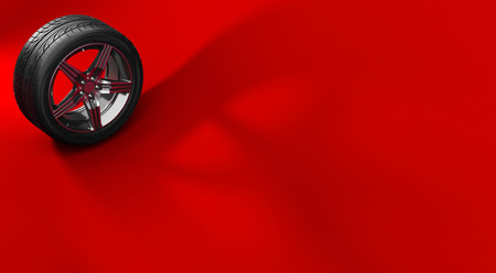 Car wheel isolated on a red background with shadow. Tyre. Poster booklet cover design. 3d illustrationの写真素材