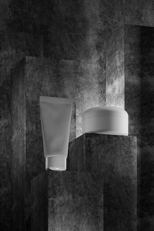 Beautiful format poster with Grey abstract stone concrete background with grayish tonalities, with white plastic containers: cream jar, tube. Realistic mock-up cosmetic. 3d illustration.の写真素材