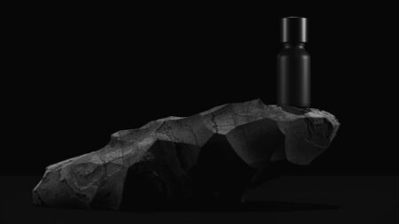 bottle of essential massage oil on stone - beauty treatment. Minimal Black design packaging mock up. 3d illustration.の写真素材