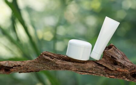 Natural Cosmetic product presentation. Ourdoors forest placement. White blank Jar shampoo bottle. 3d illustration content.の写真素材