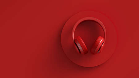 Flat lay image of wireless headphones top view. Red background solid color design. 3d illustrationの写真素材