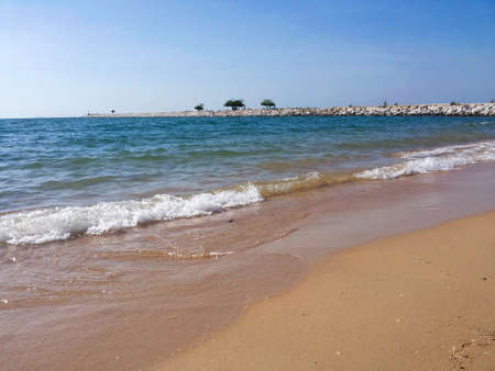 The sea is clear on a windy dayの写真素材