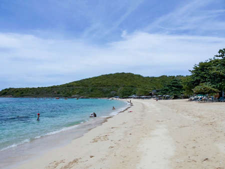White sand beach, calm waterの写真素材