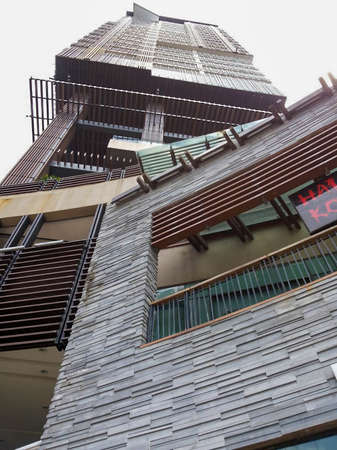looking up at a tall buildingの写真素材