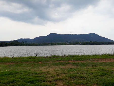 grass, water, mountainの写真素材