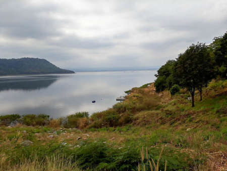 Tropical lake on a cloudy dayの写真素材