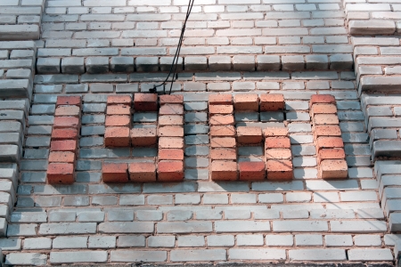 red brickwork, the number 1961 on background white bricksの写真素材