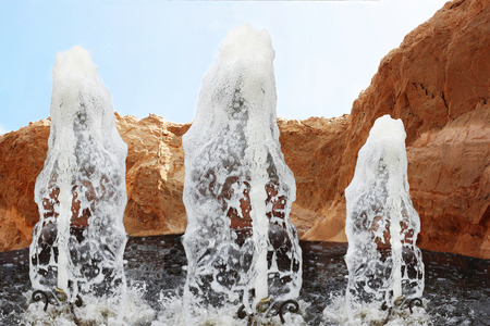 the scenic fountains on background sand hillsの写真素材
