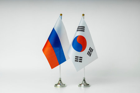 State flags of Russia and South Korea on a light background.の写真素材