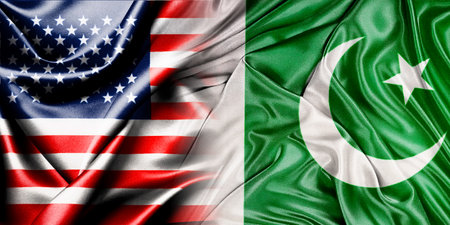 The national flags of the United States and Pakistan are placed side by side on a fluttering cotton background. Flags.の写真素材