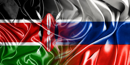 The national flags of Russia and Kenya are combined into one and placed side by side on a fluttering cotton background.の写真素材