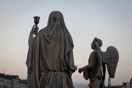 The statue in front of Gran Madre church (Turin, Italy) which is believed to be a place where the The Holy Grail is hiddenの写真素材
