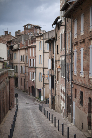 Typical french narrow medieval street Rue Caminade Albiの写真素材