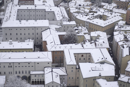 Urban geometry of Salzburg rooftops covered with snow, close-upの写真素材