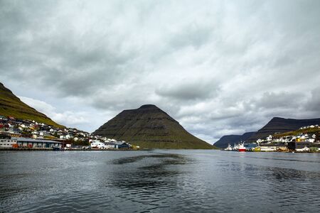 The island of Kunoy on a cloudy day, view fromf Klaksvik, Faroe Islands, Denmark. Long exposure.の写真素材