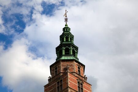 Copenhagen, Denmark - 12 September 2019: Tower of Rosenborg castle on a bright blue skyのeditorial素材