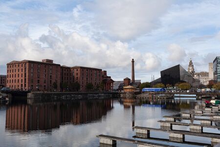 Liverpool, UK - 19 October 2019: Buildings in the area of Albert Dock and Salthouse Dock reflected in the waterのeditorial素材
