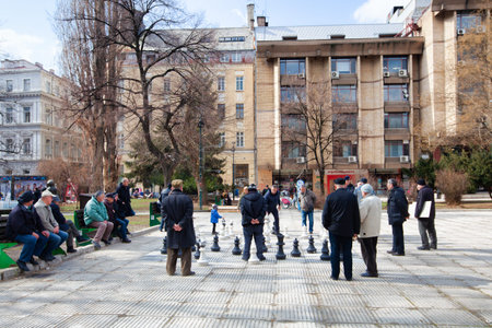 Sarajevo, Bosnia and Herzegovina - 27 February: people playing giant chess on a square in Sarajevo