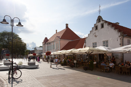 Kuressaare, Saaremaa, Estonia - 9 August 2019: Square in the town center showing building situated on Tallinna street 1のeditorial素材