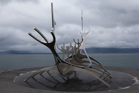 Reykjavik, Iceland - June 17, 2014: Sun Voyager on a gloomy day with dramatic skyのeditorial素材