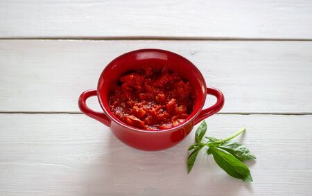 Chopped tomatoes on a white background. Top viewの写真素材