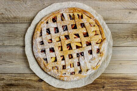 Plum apple pie. Cooking. Recipes vegetarian foodの写真素材