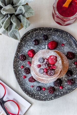 Pancakes with blackberries, raspberries and red currants. American cuisine. Dessert. Recipes Breakfastの写真素材