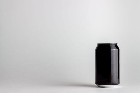 Black aluminum can on a white background. Mock-up. Copy space. Beverage design