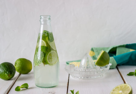 Homemade lemonade with lime and mint. Cold drinks. Recipes. Veganism. Healthy eating. Diet.