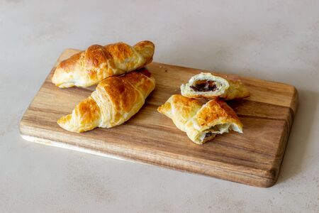 French croissants with chocolate filling. Baking. National cuisine. Breakfast. Vegetarian foodの写真素材