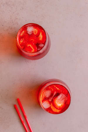 Strawberry lemonade on a pink background . Cold drinks. Summer. Recipeの写真素材