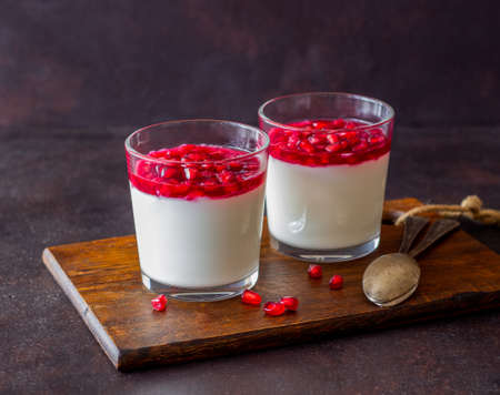 Italian dessert panna cotta with pomegranate. Vegetarian food. Healthy eating. Recipeの写真素材