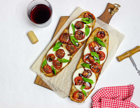 Bruschetta caprese with mozzarella, tomatoes and basil. Healthy eating. Vegetable foodの写真素材