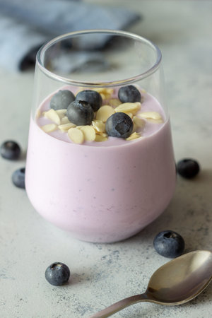 Yogurt with blueberries and almonds. Healthy eating. Vegetarian food. Breakfast. Dessert
