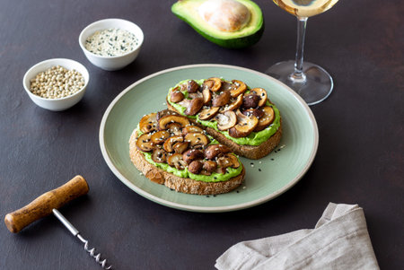 Bruschetta with mushrooms and avocados. Healthy eating. Vegetarian food. Keto diet