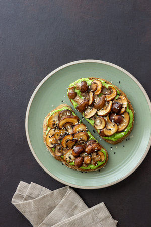 Bruschetta with mushrooms and avocados. Healthy eating. Vegetarian food. Keto diet