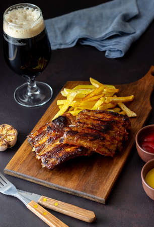 Barbecue ribs with French fries. American cuisine. Grill. Bbqの写真素材