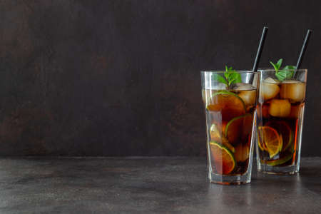 Cocktail cuba libre with lime and ice. Rum and cola Alcoholic beverages. Bar. Restaurantの写真素材