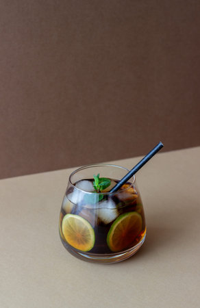 Cocktail cuba libre with lime and ice. Rum and cola Alcoholic beverages. Bar. Restaurant