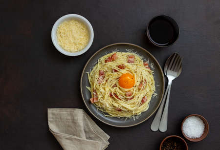 Pasta spaghetti carbonara with egg. Italian cuisine. Recipe. Foodの写真素材