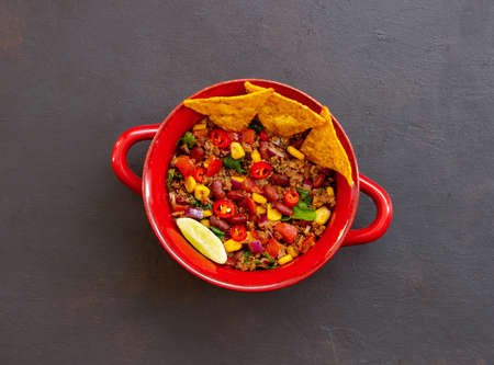 Chili con carne with nachos chips. Mexican food. National cuisineの写真素材