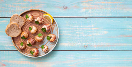 Escargots de Bourgogne. Snails with herbs butter. Healty eating. French foodの写真素材