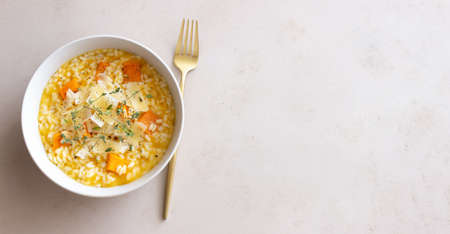 Risotto with pumpkin, cheese and thyme. Vegetarian food. healthy eatingの写真素材