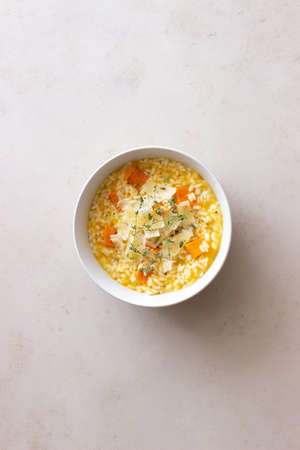 Risotto with pumpkin, cheese and thyme. Vegetarian food. healthy eatingの写真素材